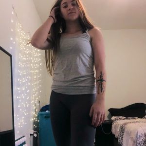 Light grey tank top, size L but fits like a M & could work as a S.